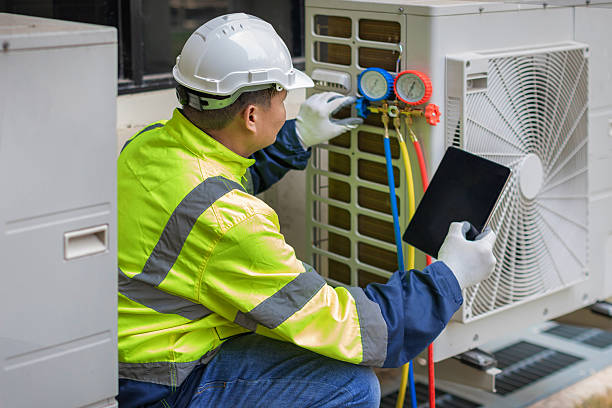 Professional Air Duct Cleaning technician working in Louisville, OH